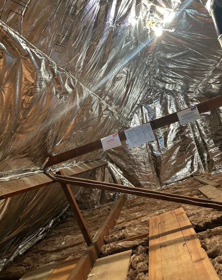 SuperFoil install with manufacturer compliance labels in place