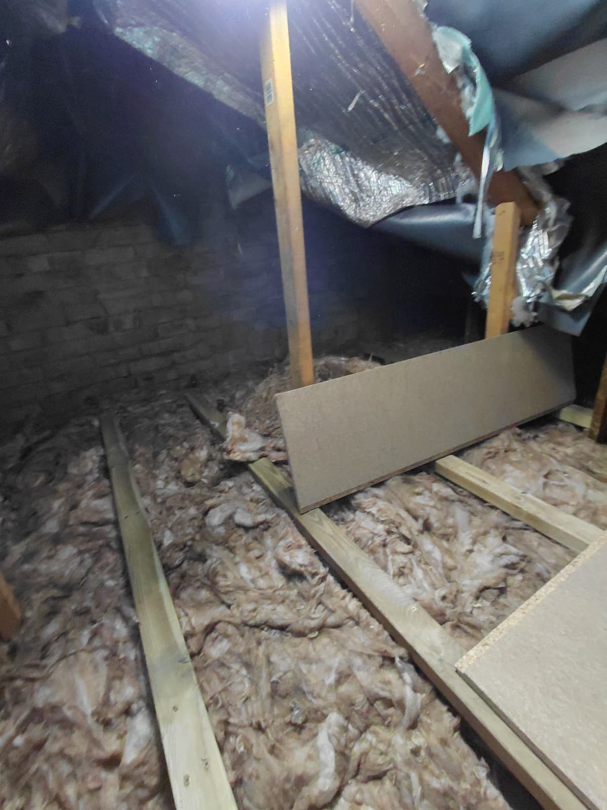 Mineral wool detailed neatly around storage and access
